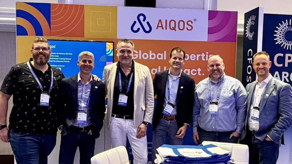 AIQOS consultant team collaborating